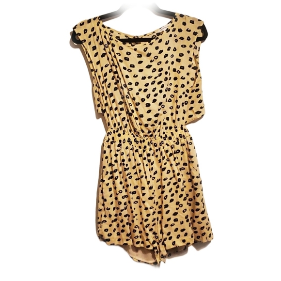 BCBGeneration Dresses & Skirts - BCBGENERATION Cheetah Back Cut Out Romper